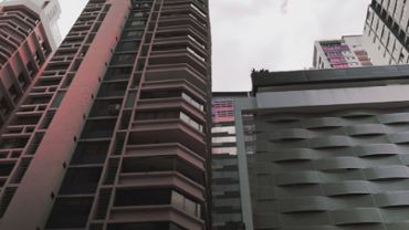 City buildings with cloudy sky