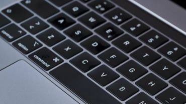 Gray laptop keyboard close up