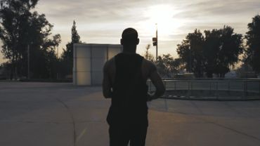 Silhouette of a runner in the city