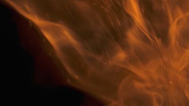 Large orange flames on black background