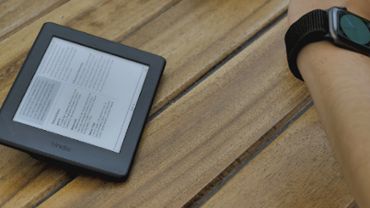 A person reading an ebook on a tablet