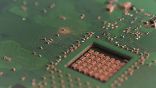 Closeup video of a motherboard with microchips