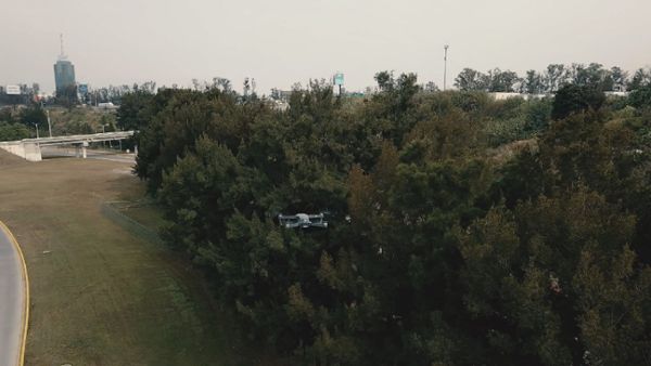 A drone flying near a freeway