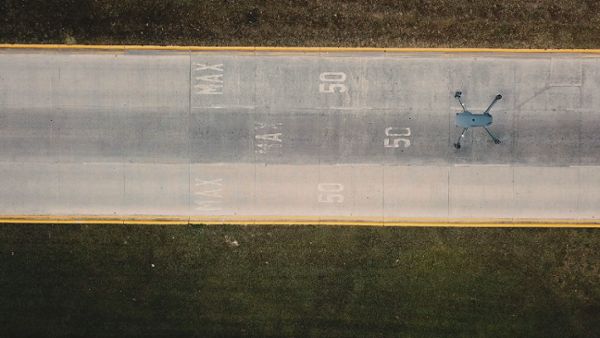 Drone flying over a street